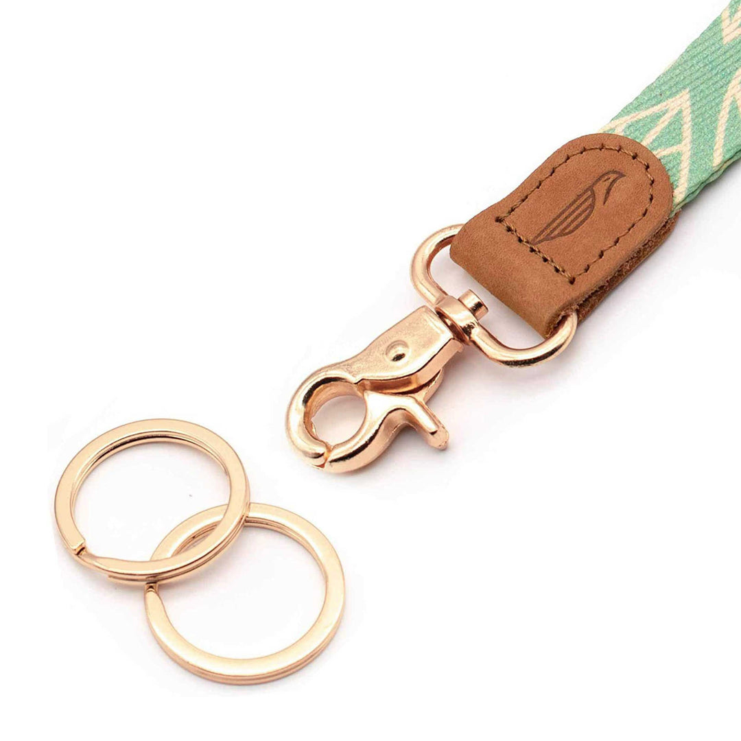 Close up lanyard with 2 gold metal key rings brown leather mint color fabric