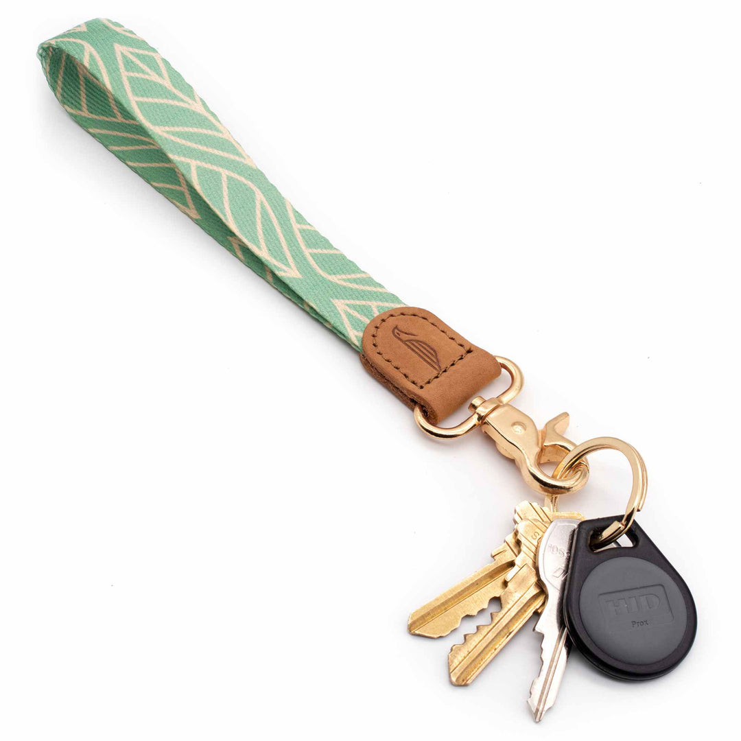Leaves patterned mint color strap lanyard with keys and car key