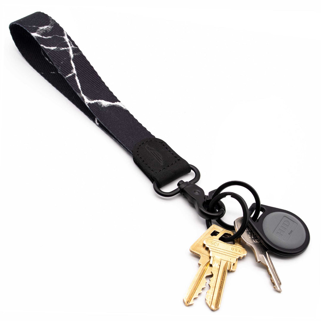Black and white marble pattern wrist lanyard with keys