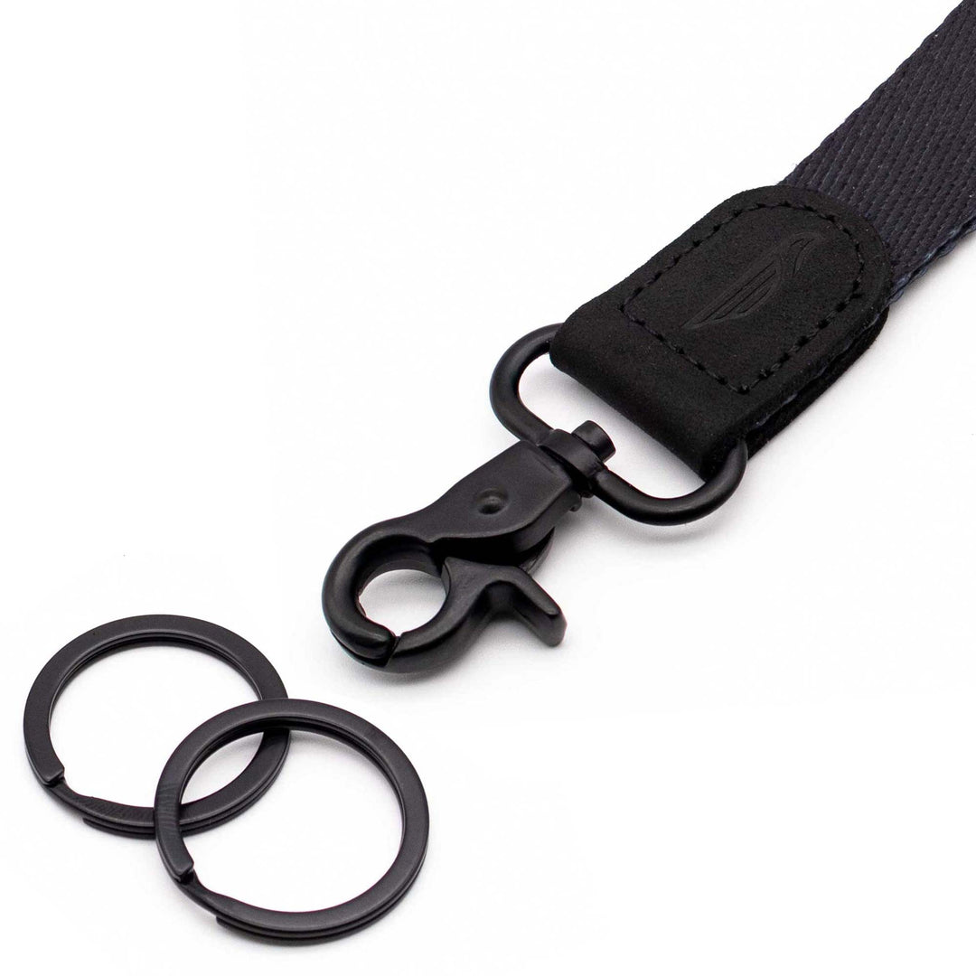 Close up black wrist lanyard with 2 key rings