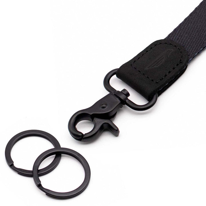 Close up black wrist lanyard with 2 key rings