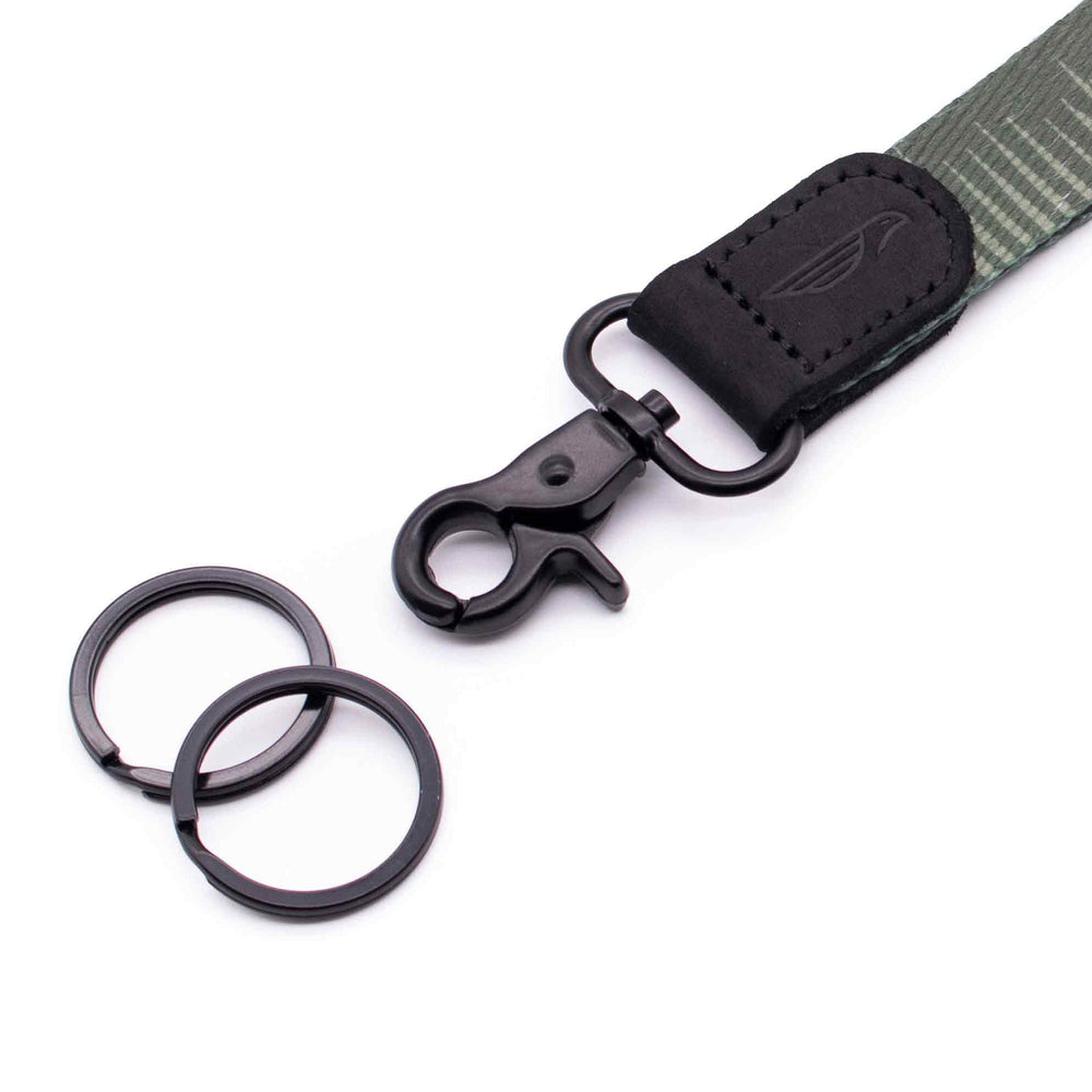Close up lanyard with 2 metal key rings black leather green fabric