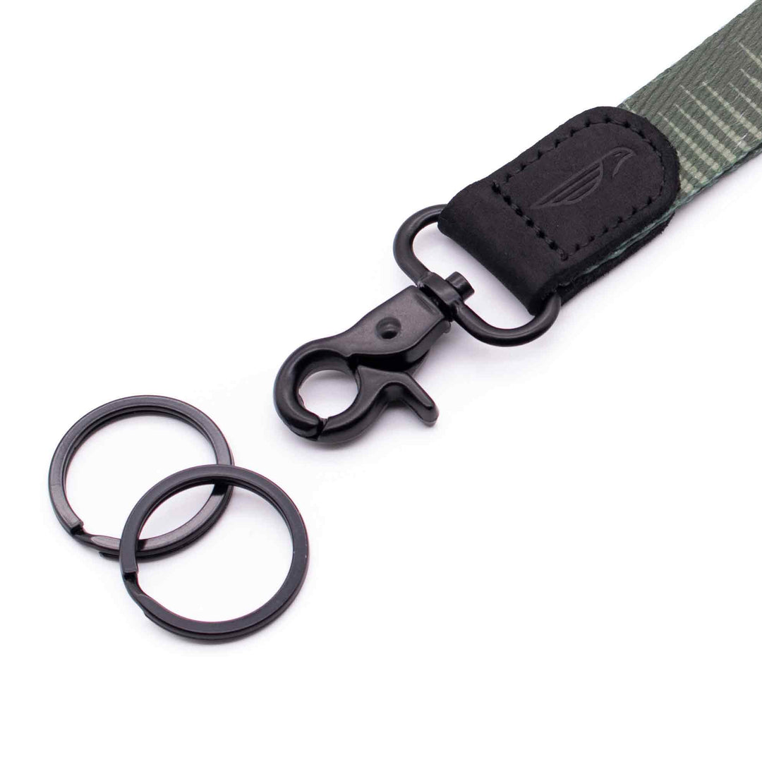 Close up lanyard with 2 metal key rings black leather green fabric