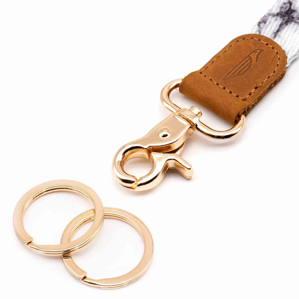 Close up lanyard with 2 gold metal key rings brown leather marble color fabric