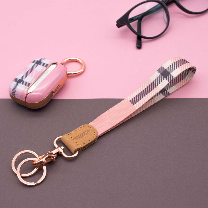 Pink Plaid Wrist keychain pink plaid airpods case black eyeglasses