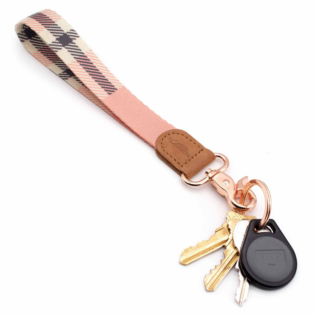 Pink cream plaid wrist lanyard with keys and car key