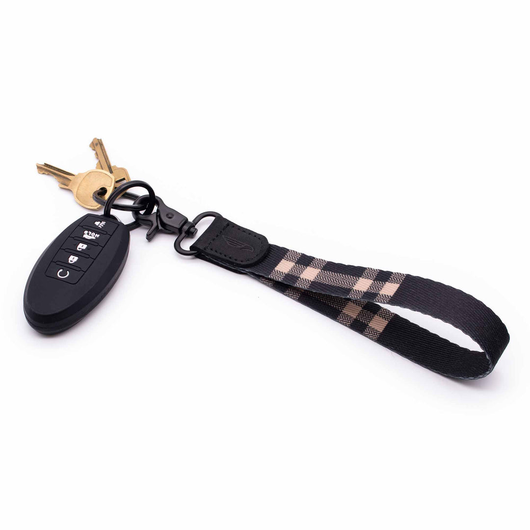 Black and cream color plaid hand wrist lanyard with keys and car key