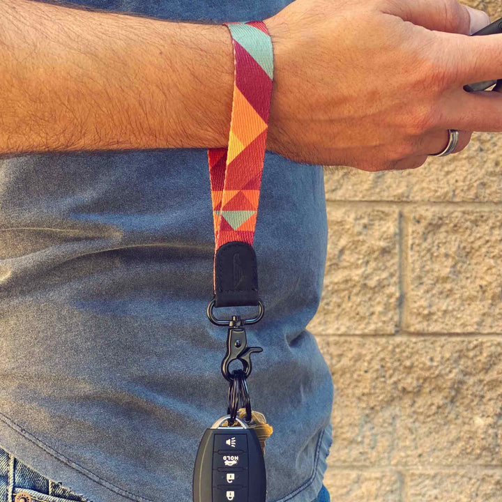 Man wears cool retro color wrist lanyard to carrying keys